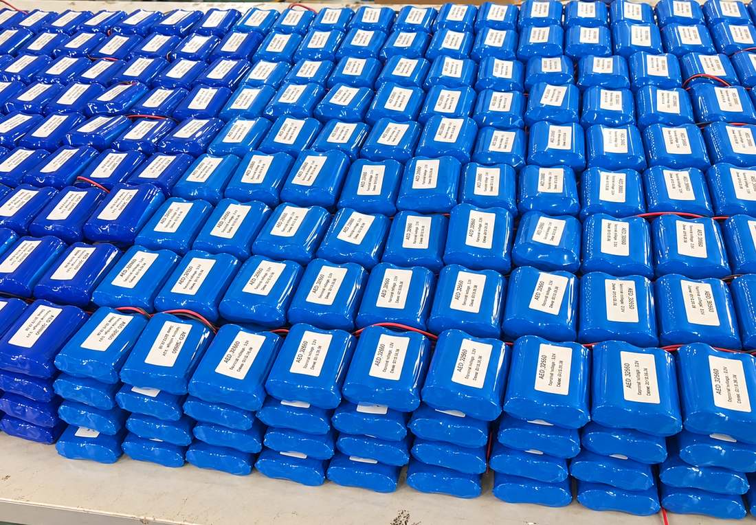 Rows of finished lithium battery packs ready for inspection